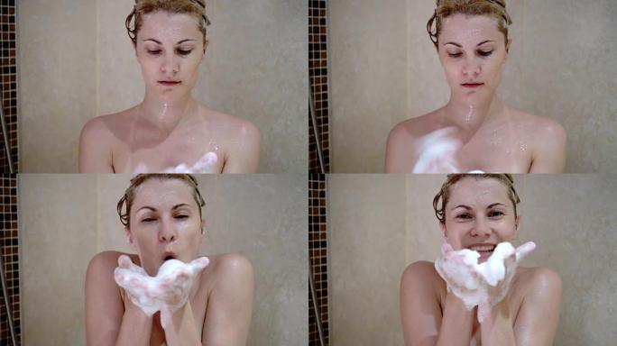 美丽迷人的年轻女子正在洗澡。女孩洗衣服，享受自己。吹塑泡沫