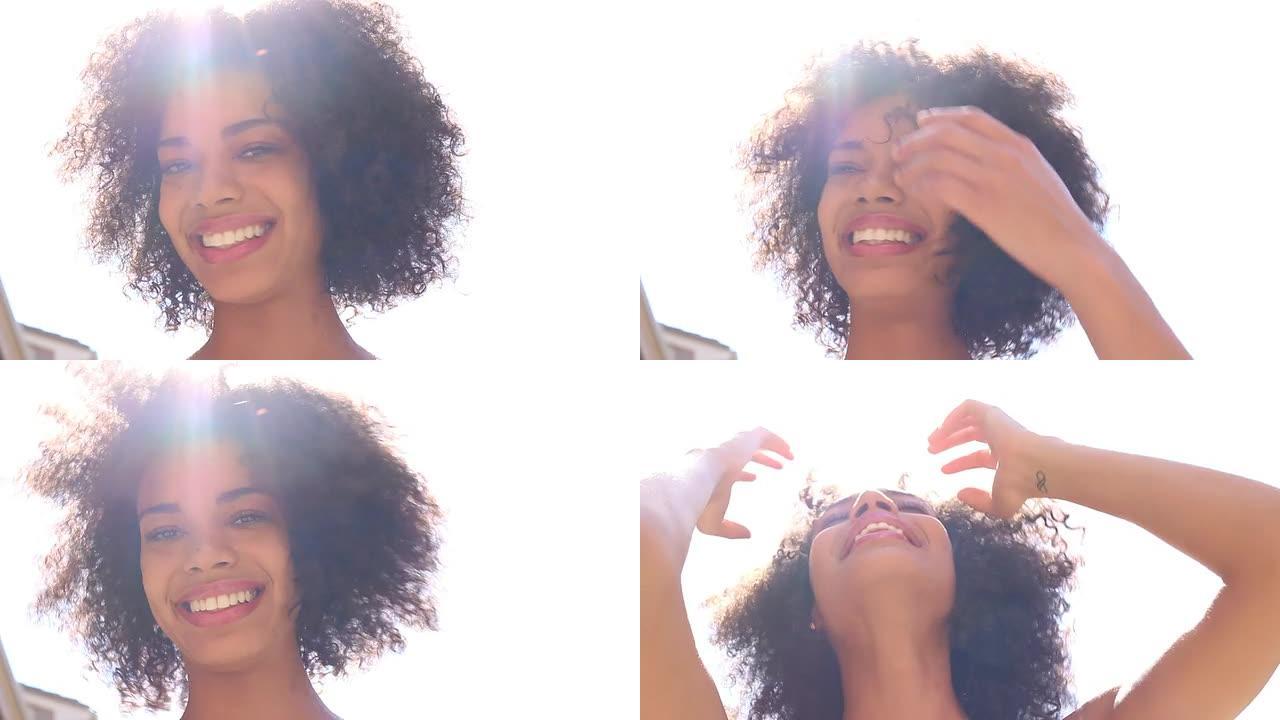 快乐的非洲裔美国女性 -- 头发上的镜头耀斑