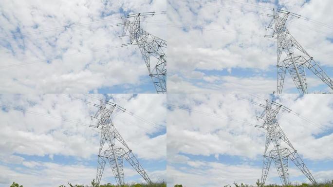 天空背景的高压塔。低角度射击
