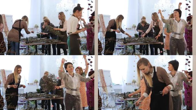 一群女性用花卉元素装饰艺术工作室