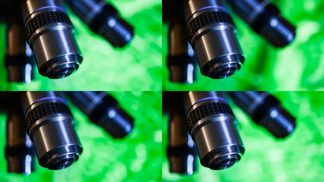 绿色背景的光学显微镜