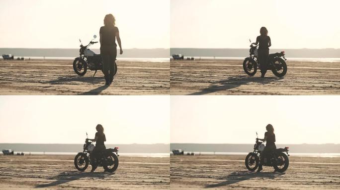 迷人的美丽的女人去她的旧咖啡馆赛车摩托车，坐在上面骑走。女摩托车骑手。