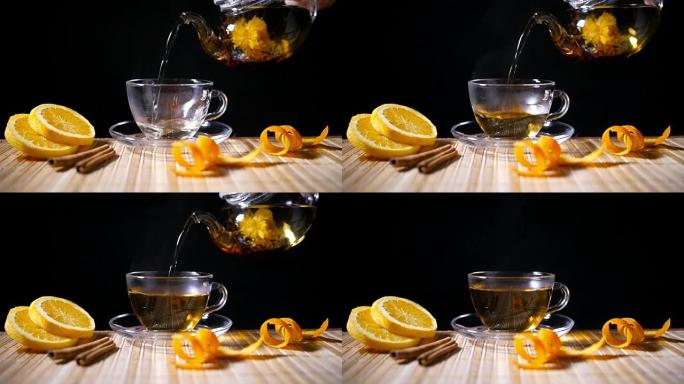 用肉桂和橙子倒盛开的茶