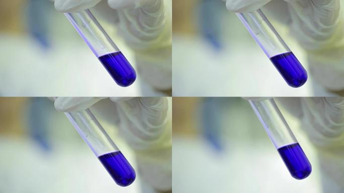 试管特写。医疗设备。科学家在实验室中使用微量移液管的特写镜头。实验室技术人员将液体注入微量滴定板。试