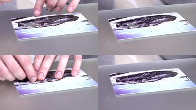 这个男孩收集了一个拼图，特写