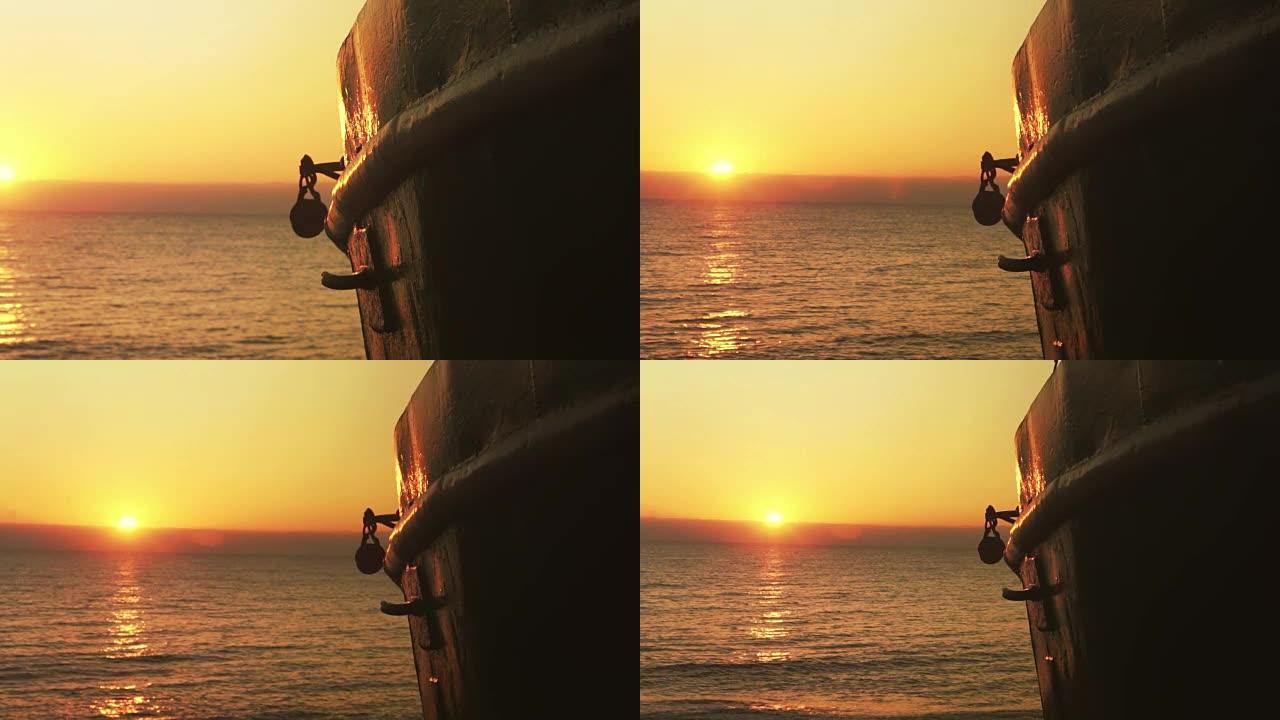 日落时在海滩上的渔船