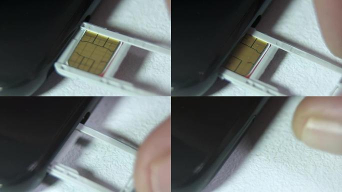 将nano SIM和存储卡托盘插入新手机特写