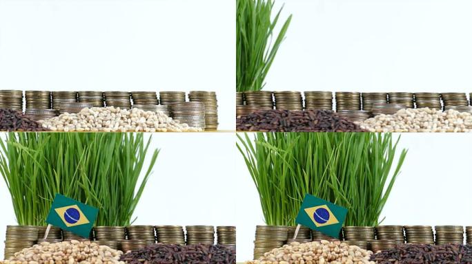 巴西国旗挥舞着一堆硬币和一堆小麦