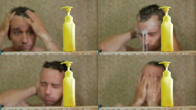 一个在酒店洗澡的男人。他将洗发水倒在手中，肥皂头