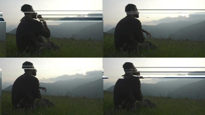 年轻的坐着的男人在山上视频高清全景观看