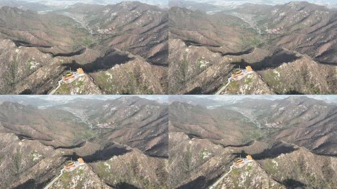 航拍初夏时节威海里口山的青翠山野