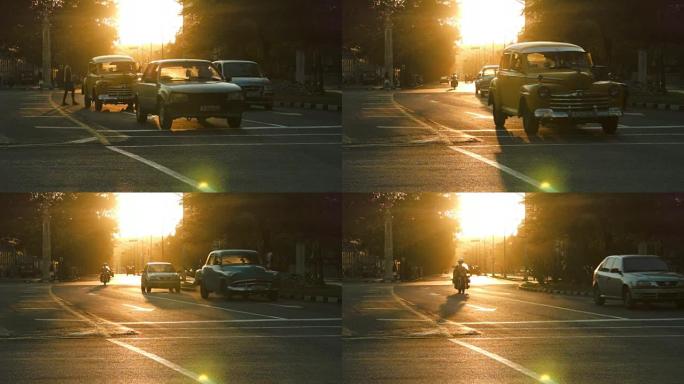 哈瓦那日落中的经典汽车发光剪影