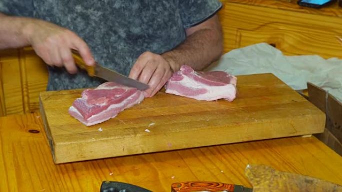 肉店中段用切肉刀切肉