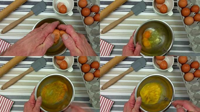 在不锈钢碗中打碎鸡蛋并搅拌鸡蛋