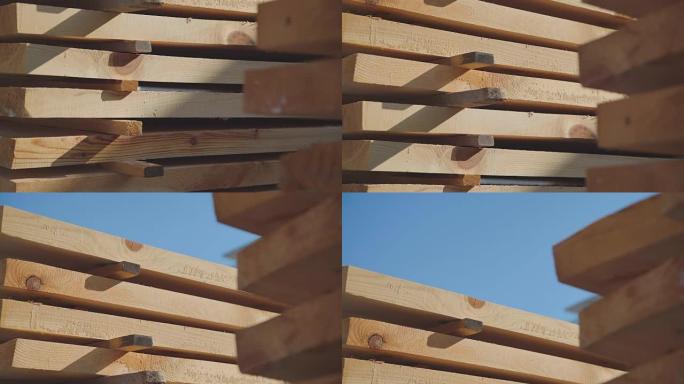 木板整齐地排成一排。建筑用板