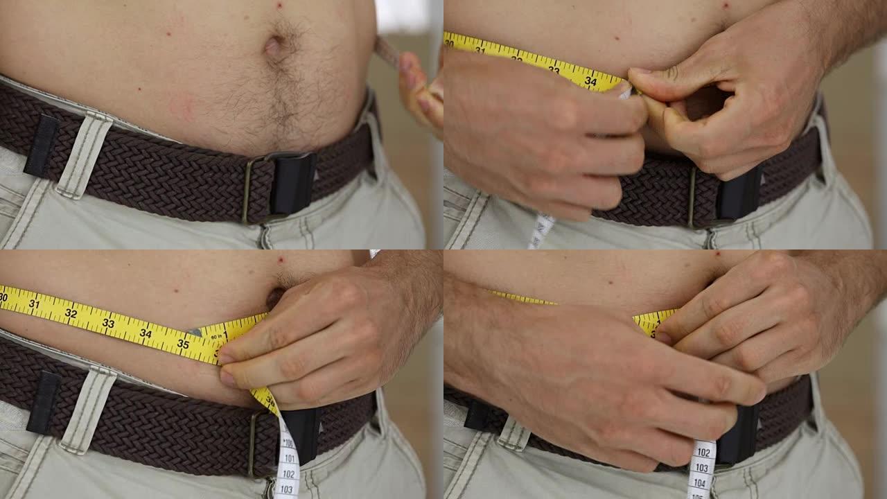 男人用胶带测量肚子