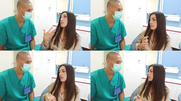 女患者与牙科医生交谈并显示牙齿酸痛
