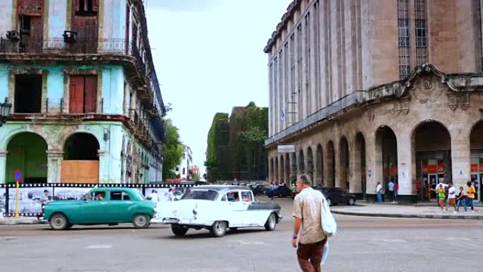 哈瓦那市中心4k古巴建筑、汽车、游客和当地人