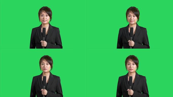 绿色屏幕上欢快的亚洲新闻记者