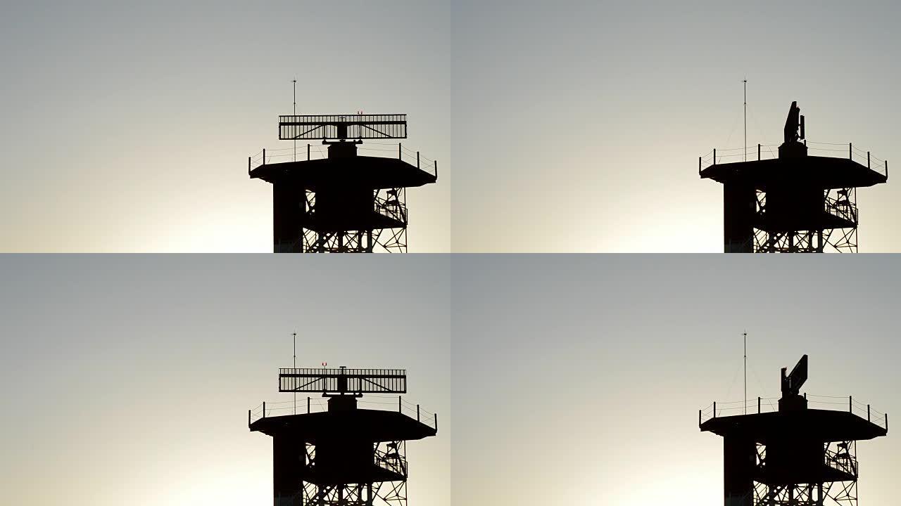 日落时机场电信塔中的雷达旋转