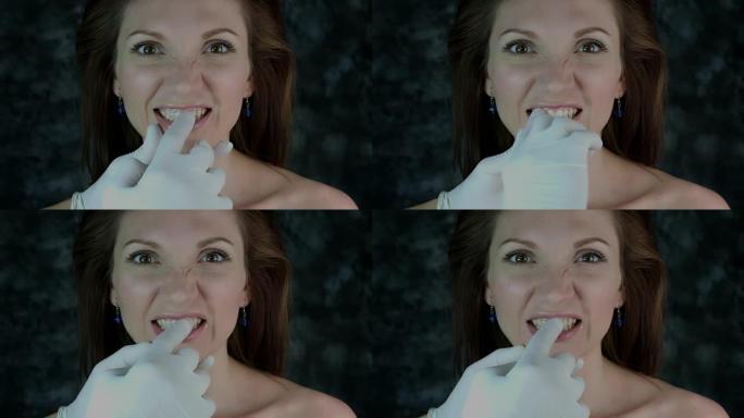 一名妇女接受牙齿美白治疗的4k镜头