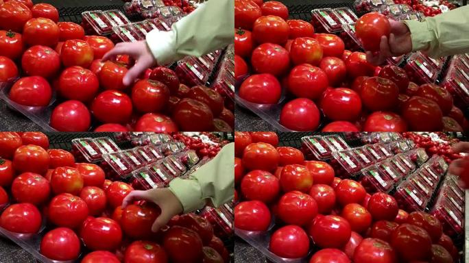在杂货店选择田间西红柿的女人