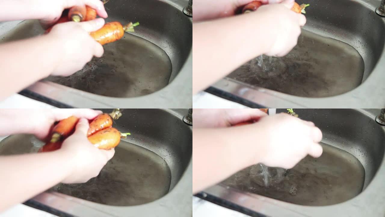 洗水槽里的胡萝卜。