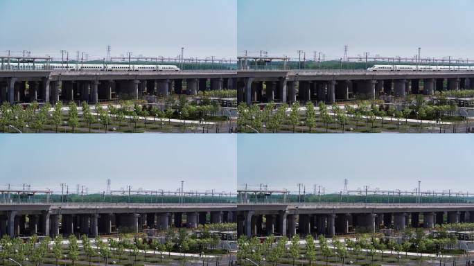 行驶中的高铁列车中国铁路和谐号铁路高架
