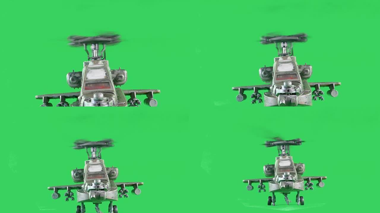 一架武装直升机在绿幕上飞行