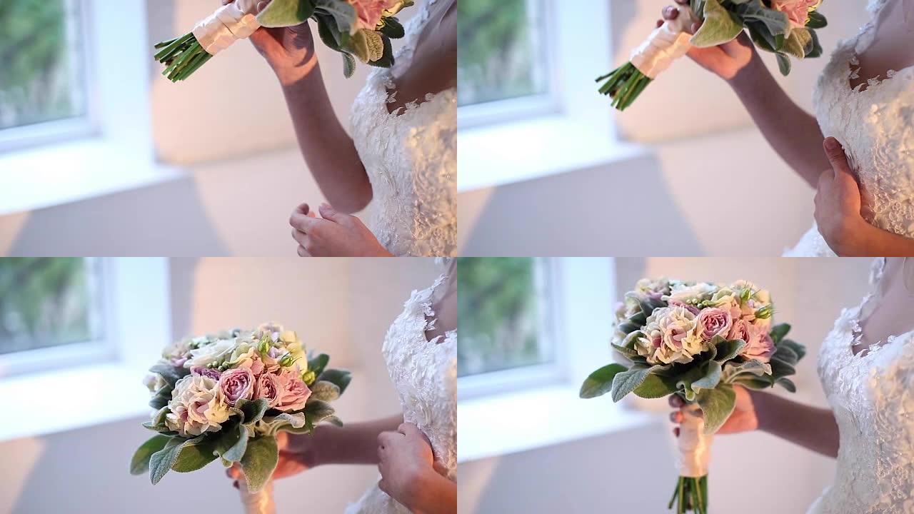 年轻新娘手中的美丽新娘花束