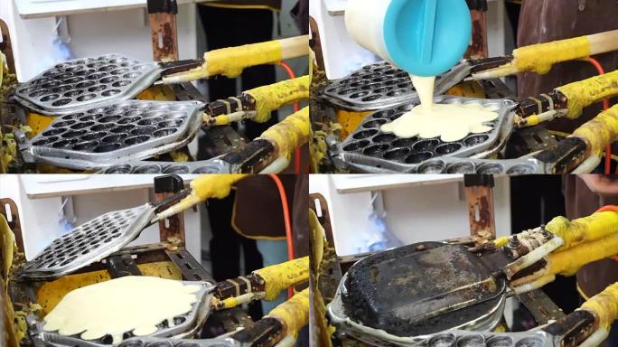 香港老式蜂蜜梳子华夫饼的制作。用钢痣在商店新鲜制作