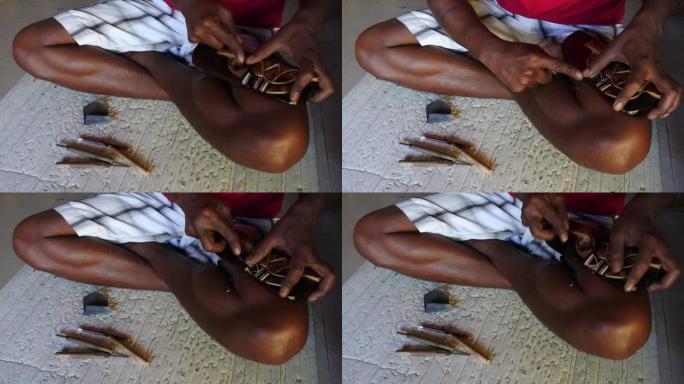 斐济土著男子的手雕刻海龟