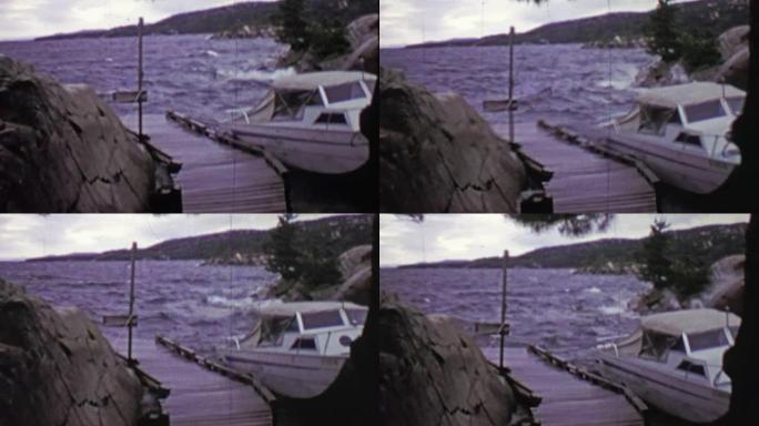1957: 在暴风雨的大风天气中，船被绑在码头上。