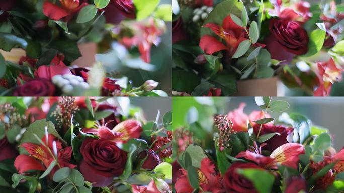 特写，花束在光线中，旋转，组成由阿尔斯特罗梅，玫瑰威望，布鲁尼亚绿色，一枝黄花，桉树，玫瑰介子形波尔