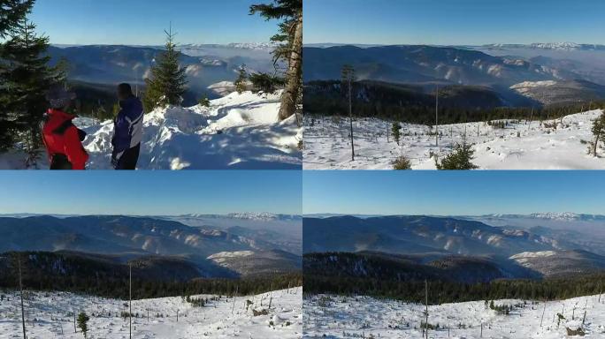 徒步旅行者休息。雪冬景观。体育娱乐活动。假日度假旅游。飞过去。空中