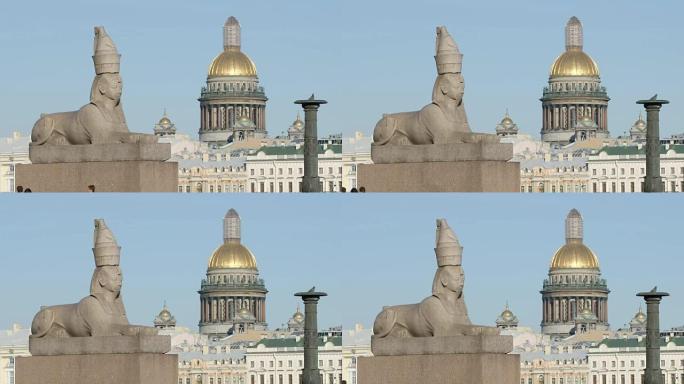 特写: 俄罗斯圣彼得堡瓦西里耶夫斯基岛的堤岸上的艾萨克大教堂和埃及古董狮身人面像