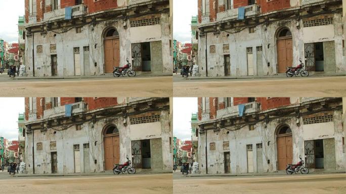 汽车驶过哈瓦那老街的小巷