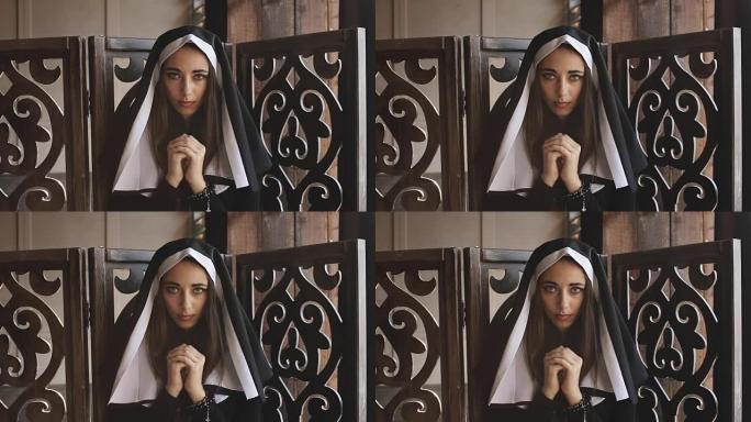 修女祈祷并注视镜头
