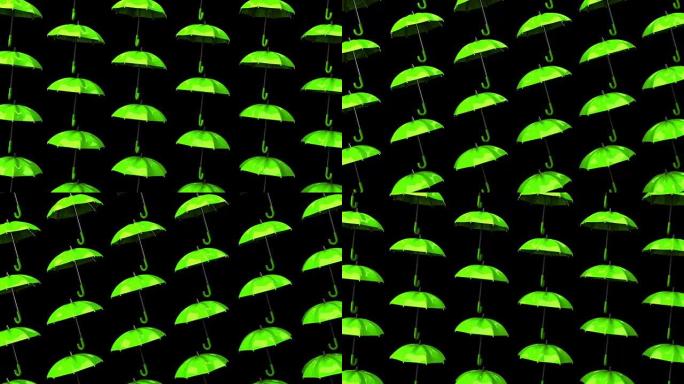 黑色背景上的绿色雨伞