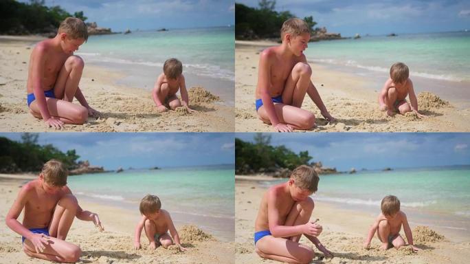 一个年轻人在海滩上和孩子玩耍。制作砂模