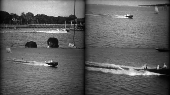 1934: 滑水穿越墨西哥湾沿岸大厦的帆船和码头的背景。