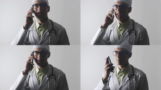 医生用手机讲话。医务人员进行电话咨询。