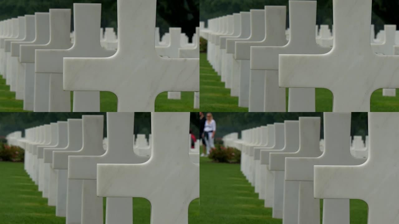 近距离观察墓地里的白色十字架