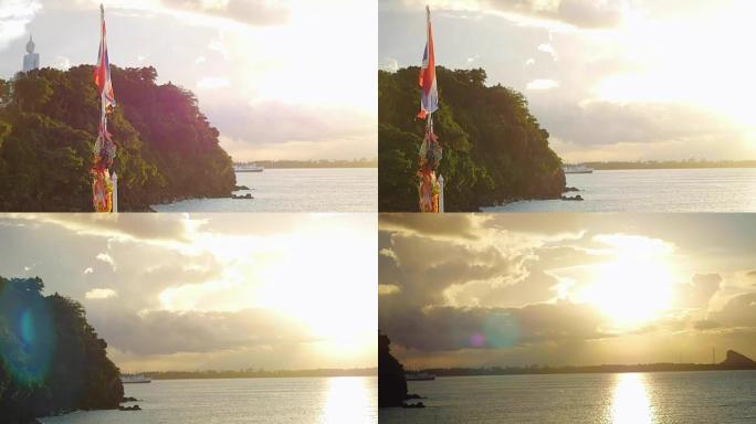 泰国苏梅岛，非常著名的旅游胜地，美丽的日落美景泰国国旗在国际港口。旗帜在慢动作的风中飘扬，1920x