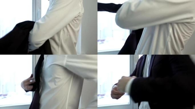 一个穿白衬衫的男人穿时髦的夹克。