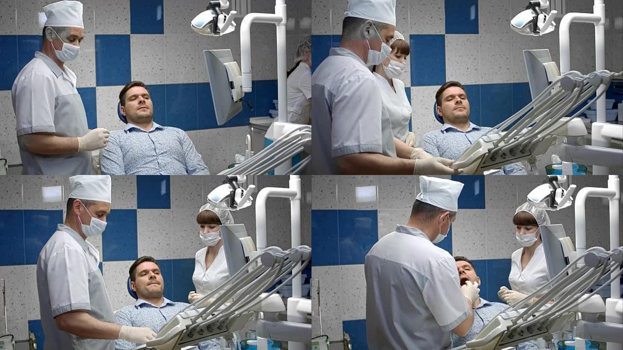男性客户正在接受牙医检查牙齿