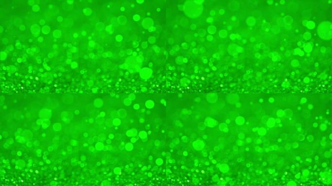 绿色闪闪发光的颗粒纹理背景