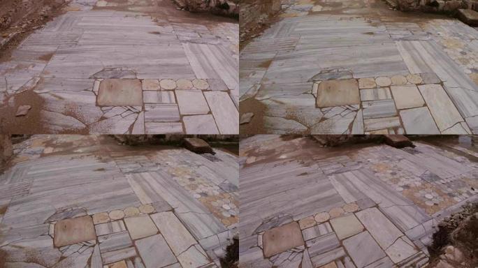 在仿古小镇萨拉米斯东塞浦路斯法马古斯塔的地板上铺设大理石瓷砖