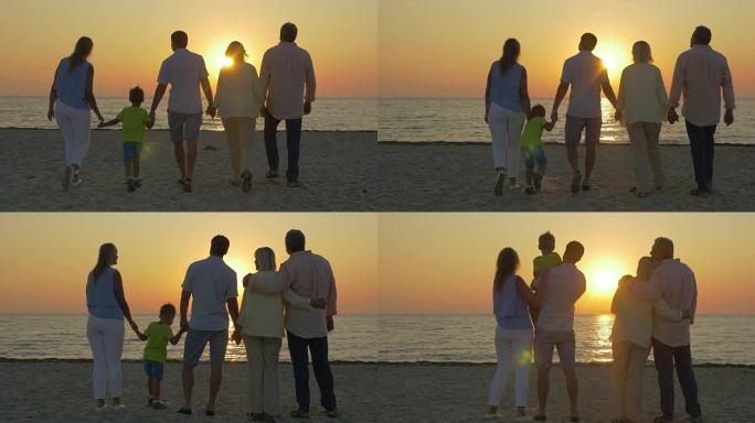 一家人看着金色的日落在海上