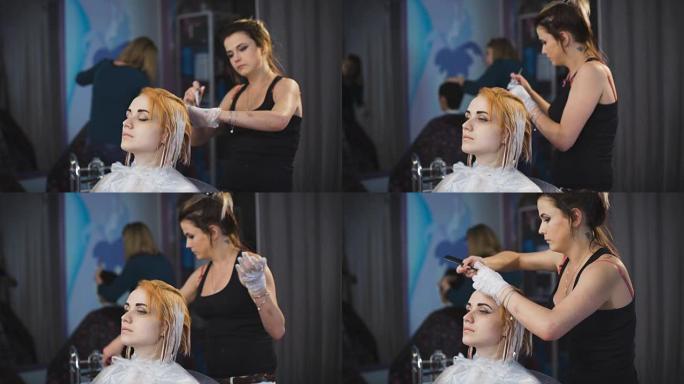 发型师美发师在客户的头发上做专业油漆